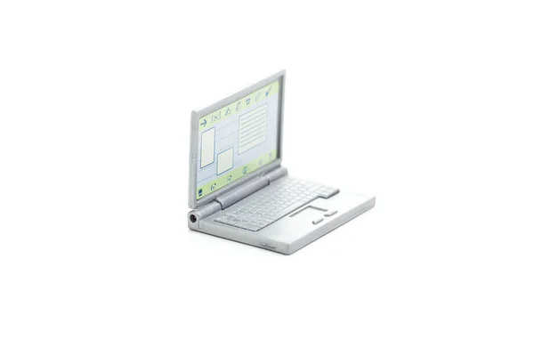 Miniatur-Laptop isoliert auf weiß — Stockfoto