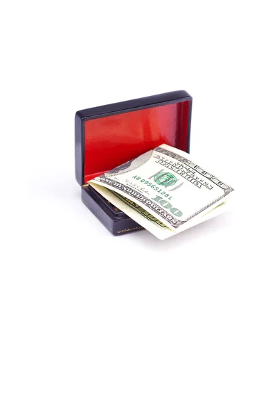 Kara kutu üzerinde beyaz izole dolar — Stok fotoğraf