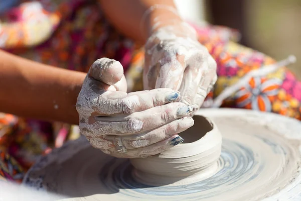 stock image Hand on a potter wheel at the fair