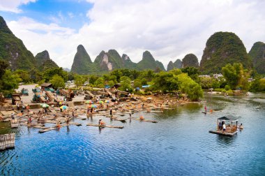 Bamboo rafting in Yangshuo li river clipart