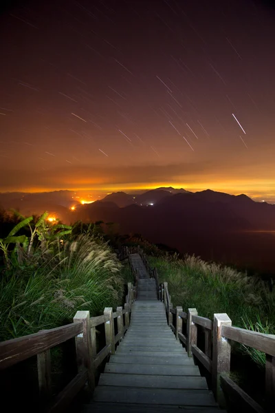 Stock image Night landscape in mountains and the dark blue sky with clouds