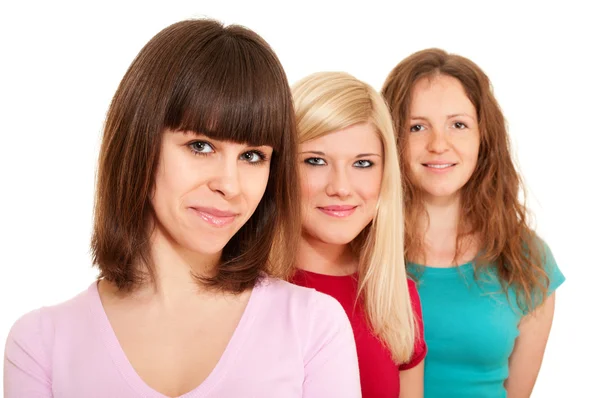 Three women brunette, blonde and redhead in a row — Stock Photo, Image