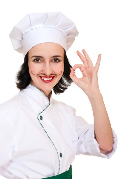 Krásná žena v kuchař jednotný znakem ok — Stock fotografie