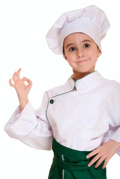 Menino em uniforme de chef com sinal ok — Fotografia de Stock