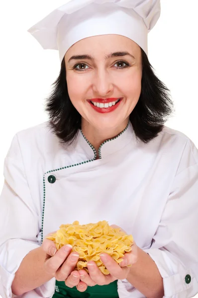 Chef mujer sosteniendo macarrones puñado —  Fotos de Stock