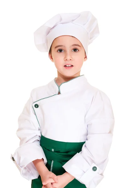 Liten pojke cookee i uniform — Stockfoto