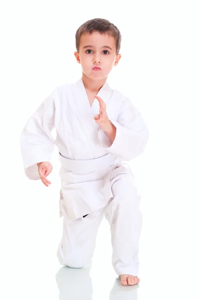 Aikido boy fighting position in white kimono — Stock Photo, Image
