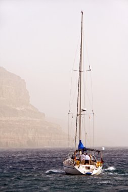 Boat off coast of Gran Canaria clipart