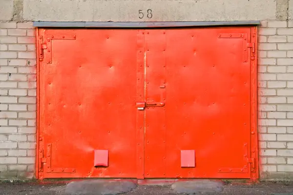 Stock image Red garage door