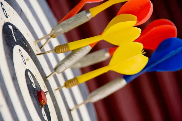 stock image Darts missing the bullseye