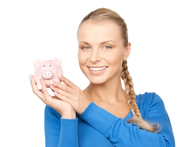 Mulher encantadora com banco porquinho — Fotografia de Stock