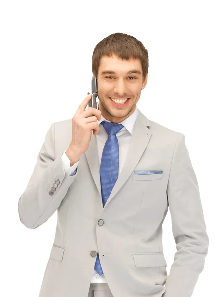 Красивый мужчина с сотовым телефоном — стоковое фото