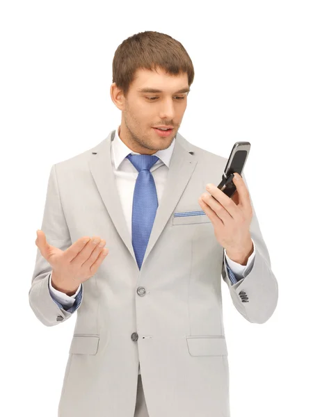 Pohledný muž s mobilní telefon — Stock fotografie
