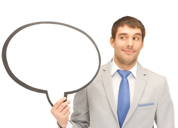 Smiling businessman with blank text bubble — Stock Photo, Image