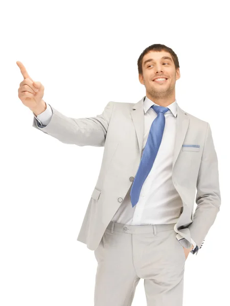 Businessman pointing his finger Stock Picture