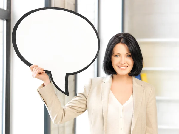 Smiling businesswoman with blank text bubble — Stock Photo, Image