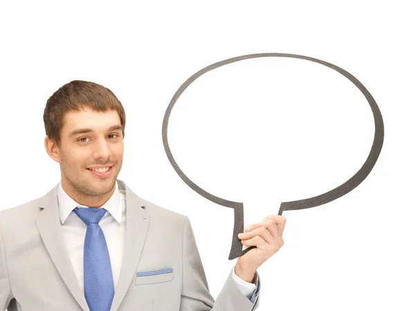 Smiling businessman with blank text bubble — Stock Photo, Image