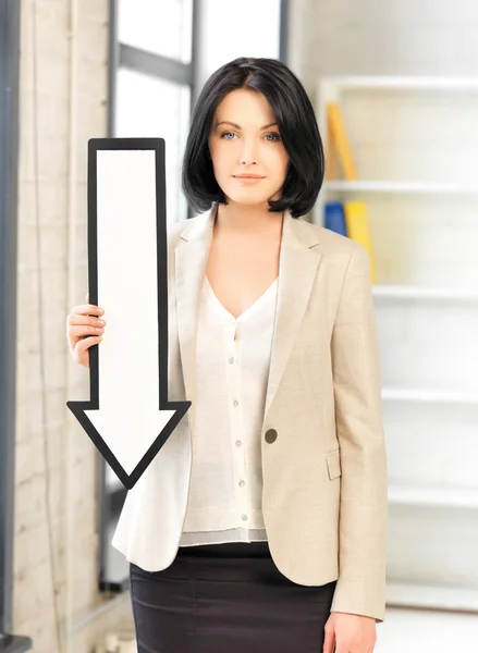 Businesswoman with direction arrow sign — Stock Photo, Image