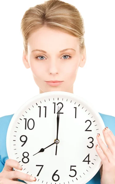 Woman holding big clock — Stock Photo, Image