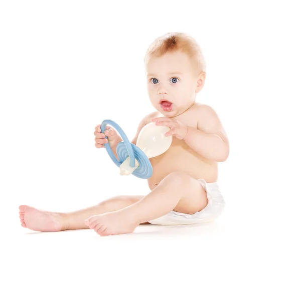 Baby boy with big pacifier — Stock Photo, Image