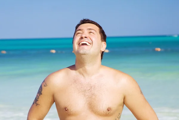 Happy man on the beach — Stock Photo, Image