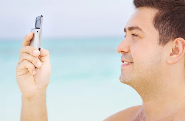Happy man with cell phone — Stock Photo, Image