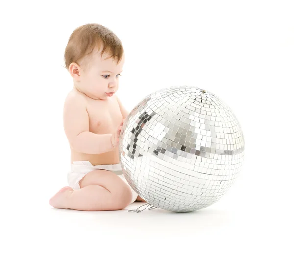 Adorable baby boy with big disco ball — Stock Photo, Image