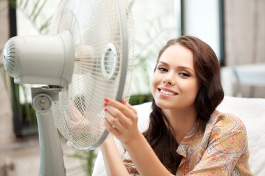 Happy woman with big fan clipart