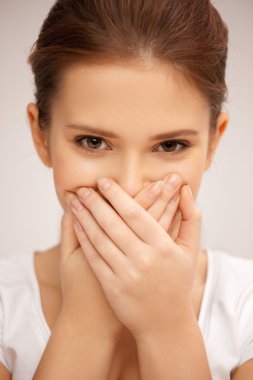 Woman with hand over mouth clipart