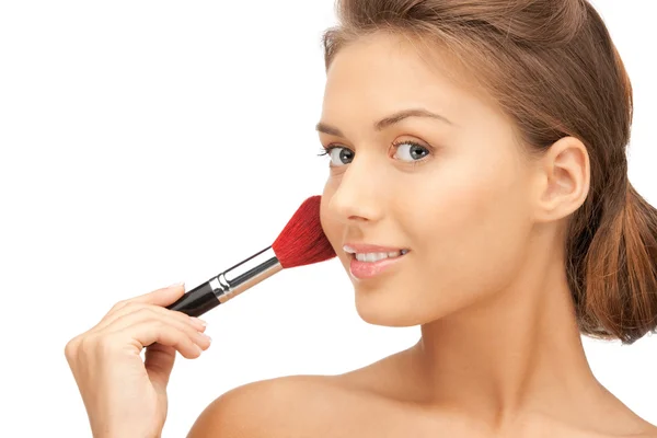 Beautiful woman with brush Stock Picture