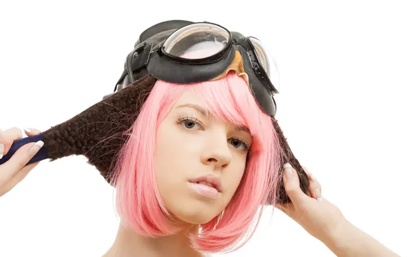 Mädchen mit rosa Haaren im Fliegerhelm — Stockfoto