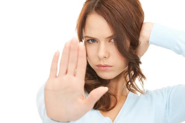 Woman making stop gesture Royalty Free Stock Photos