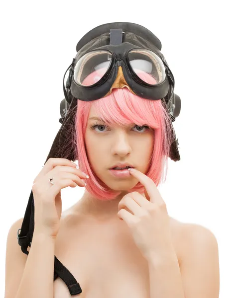 Розовая девушка в шлеме летчика — стоковое фото