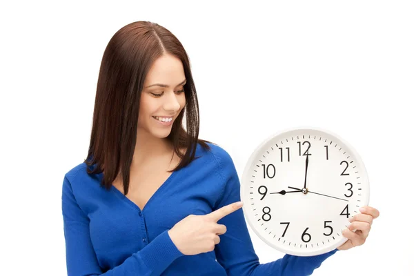 Woman holding big clock Stock Photo
