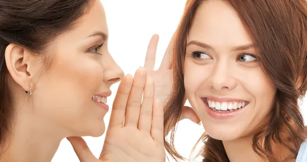 Two women spreading gossip — Stock Photo, Image