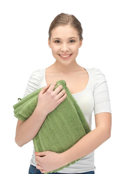 Linda dona de casa com toalhas — Fotografia de Stock