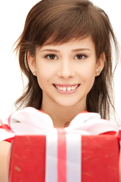 Happy teenage girl with gift box — Stock Photo, Image