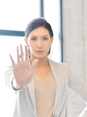 Woman making stop gesture clipart