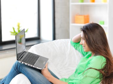 Happy woman with laptop computer clipart