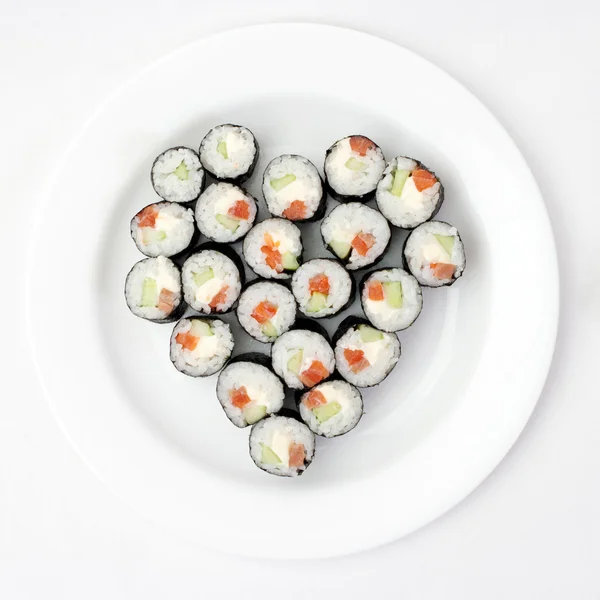 stock image Sushi on a plate in the shape of heart