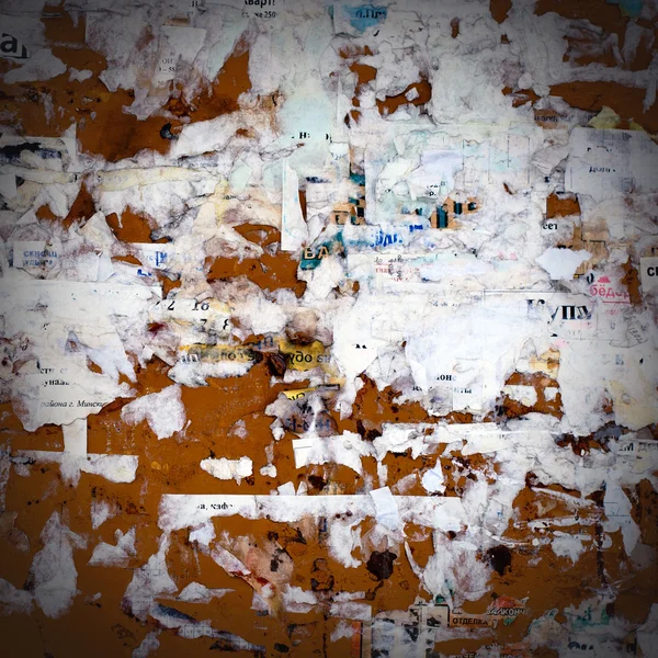 stock image Grunge wall with old pieces of paper