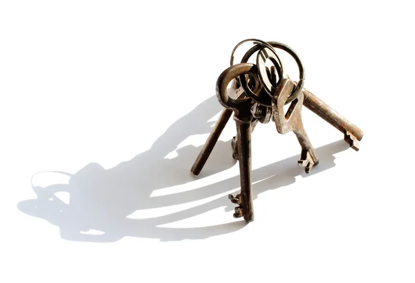 Bunch of old keys isolated on white background — Stock Photo, Image
