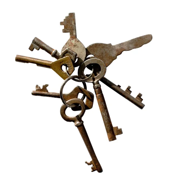 Kilka starych kluczy odizolowanych na białym tle — Zdjęcie stockowe