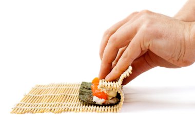 Rolling sushi maki clipart