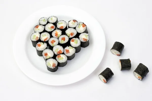 Sushi na talíř ve tvaru srdce — Stock fotografie