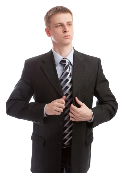 Empresário botões seu terno — Fotografia de Stock