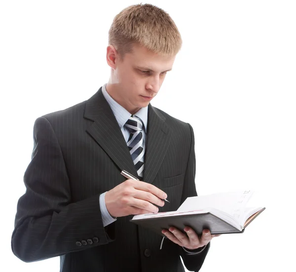 stock image Man making notes in diary