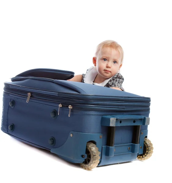 Baby und Koffer — Stockfoto