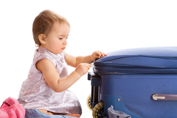 Baby стиснути чемодан — стокове фото