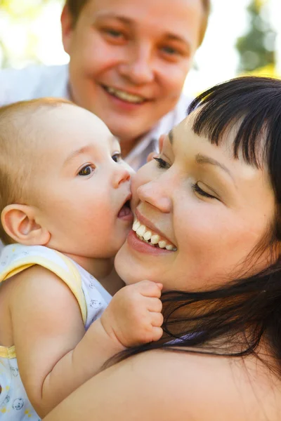 Young parents with baby — Stock Photo, Image